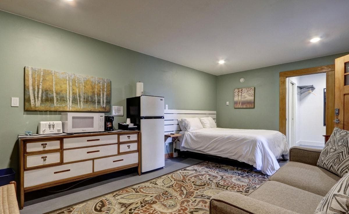 Queen Size Bed and Queen Sleeper Sofa with Comfortable Memory Foam Mattress. Table and bench. 